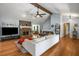 Inviting living room featuring a stone fireplace, vaulted ceilings and hardwood floors at 2795 Bentwood Dr, Marietta, GA 30062