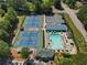 Aerial view of the community pool and tennis courts at 5706 Brookstone Nw Walk, Acworth, GA 30101