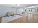 Spacious finished basement featuring light walls, bar area, and durable floors at 5706 Brookstone Nw Walk, Acworth, GA 30101
