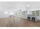 Finished basement featuring light walls, durable floors, and bar area at 5706 Brookstone Nw Walk, Acworth, GA 30101
