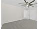Bedroom with plush carpeting, modern ceiling fan, and a closet at 5706 Brookstone Nw Walk, Acworth, GA 30101