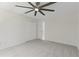 Bedroom featuring plush carpeting, a closet, and modern ceiling fan at 5706 Brookstone Nw Walk, Acworth, GA 30101