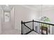 Bright hallway with chandelier and view of front door and yard at 5706 Brookstone Nw Walk, Acworth, GA 30101