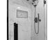 Shower with modern fixtures, marble look tiles and a built-in storage niche at 5706 Brookstone Nw Walk, Acworth, GA 30101