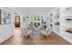 Bright sitting room with hardwood floors, built-in shelving, modern décor and plenty of seating at 5706 Brookstone Nw Walk, Acworth, GA 30101