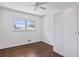 Bedroom showcasing hardwood floors, closet space, and natural light at 805 Gertrude Nw Pl, Atlanta, GA 30318