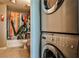 Cozy bathroom featuring a stackable washer/dryer for added convenience at 860 Peachtree Street Northeast Ne St # 811, Atlanta, GA 30308