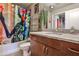 Tastefully decorated bathroom featuring a vanity with granite countertop, and decorative shower curtain at 860 Peachtree Street Northeast Ne St # 811, Atlanta, GA 30308