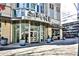 Elegant building entrance with glass doors and landscaping at 860 Peachtree Street Northeast Ne St # 811, Atlanta, GA 30308
