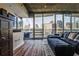 Stylish living room featuring hardwood floors and a beautiful city view at 860 Peachtree Street Northeast Ne St # 811, Atlanta, GA 30308