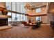 Spacious resident lounge with fireplace, chandelier, and ample seating at 860 Peachtree Street Northeast Ne St # 811, Atlanta, GA 30308