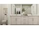 Bathroom featuring a double vanity, a large mirror, and great lighting at 2276 Linden Pass, Douglasville, GA 30135