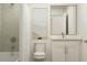 Bright bathroom featuring a shower/tub combo and a modern vanity with sink at 2276 Linden Pass, Douglasville, GA 30135
