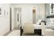 Light filled bedroom with open closet and neutral color palette at 2276 Linden Pass, Douglasville, GA 30135