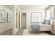 Bedroom with linen bedding, walk in closet and modern decor at 2276 Linden Pass, Douglasville, GA 30135