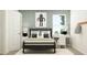 Modern bedroom with bed, white desk, and stylish decor at 2276 Linden Pass, Douglasville, GA 30135