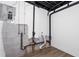 Unfinished basement with new flooring and utility pipes at 4771 N Springs Nw Rd, Kennesaw, GA 30144