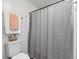 Clean bathroom featuring tile flooring, modern fixtures, and a shower with curtain at 4771 N Springs Nw Rd, Kennesaw, GA 30144
