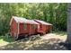 Well-maintained home featuring a front porch, lush yard and mature trees at 4771 N Springs Nw Rd, Kennesaw, GA 30144