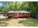Charming home featuring a front porch and large front yard at 4771 N Springs Nw Rd, Kennesaw, GA 30144