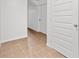 Hallway with tile floor at 4771 N Springs Nw Rd, Kennesaw, GA 30144