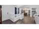 Bright and modern living room with neutral tones and views of the dining and kitchen at 4771 N Springs Nw Rd, Kennesaw, GA 30144