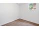 Neutral room with tile floor and natural light through window at 4771 N Springs Nw Rd, Kennesaw, GA 30144