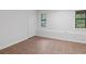 Neutral room with tile floor and natural light through windows at 4771 N Springs Nw Rd, Kennesaw, GA 30144