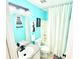 Vibrant bathroom with a vanity, toilet, tub-shower combination, and stylish decor at 96 Wildwood Dr, Temple, GA 30179