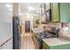 Modern kitchen features stainless steel appliances, granite countertops, and lots of storage at 1195 Milton Se Ter # 2203, Atlanta, GA 30315