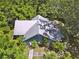 Overhead view of the house, highlighting the roof and landscape at 13795 Arnold Mill Rd, Roswell, GA 30075