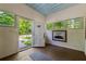 Bright foyer with an open door, light walls, wood floors, and ample natural light at 13795 Arnold Mill Rd, Roswell, GA 30075