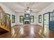 Bright and welcoming living room with fireplace, staircase, and abundant natural light at 13795 Arnold Mill Rd, Roswell, GA 30075