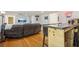 Finished basement area with bar and comfortable seating for entertaining and relaxation at 25 Grange Ct, Sharpsburg, GA 30277