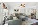 Comfortable living room featuring a large sectional sofa and stylish decor at 25 Grange Ct, Sharpsburg, GA 30277