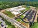 Expansive aerial view showcasing the school's facilities, grounds, and surrounding landscape at 3145 Indian Hills Ne Dr, Marietta, GA 30068