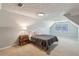 Bedroom features a textured ceiling, a comfortable bed, and a neutral color scheme at 3145 Indian Hills Ne Dr, Marietta, GA 30068