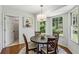 Bright breakfast nook area with a charming chandelier and natural light at 3145 Indian Hills Ne Dr, Marietta, GA 30068