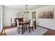 Charming dining room with hardwood floors, a chandelier, and traditional furnishings at 3145 Indian Hills Ne Dr, Marietta, GA 30068