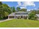 Charming two-story home boasts a well-manicured lawn and a classic design at 3145 Indian Hills Ne Dr, Marietta, GA 30068