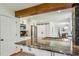 Granite countertops are highlighted in this open layout kitchen at 3145 Indian Hills Ne Dr, Marietta, GA 30068