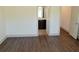 Bedroom featuring hardwood floors and ensuite bathroom with dark wood vanity at 4590 River Stone Trl, Douglasville, GA 30135