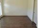 Bedroom with hardwood floors, neutral paint and large windows for plenty of natural light at 4590 River Stone Trl, Douglasville, GA 30135