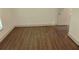 Bright bedroom features wood-look flooring and neutral paint; a tranquil space to unwind at 4590 River Stone Trl, Douglasville, GA 30135