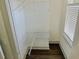 Walk-in closet with built-in shelving at 4590 River Stone Trl, Douglasville, GA 30135