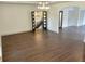 Spacious living room with hardwood floors and an entry view to a stairwell at 4590 River Stone Trl, Douglasville, GA 30135
