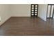 Open living area with beautiful wood floors, neutral walls, and ample natural light at 4590 River Stone Trl, Douglasville, GA 30135