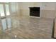 Open living area with an electric fireplace at 4590 River Stone Trl, Douglasville, GA 30135