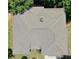 Aerial view of a well-maintained roof on a residential home, surrounded by trees at 4590 River Stone Trl, Douglasville, GA 30135