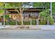 Inviting restaurant exterior with lush greenery, string lights, and a cozy patio at 1521 Deerwood Dr, Decatur, GA 30030